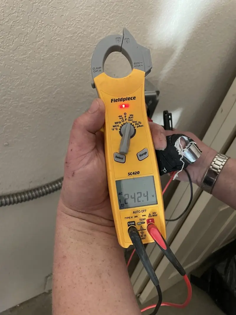 Voltage testing with clamp meter during Aluminum Wiring Replacement in Liberty